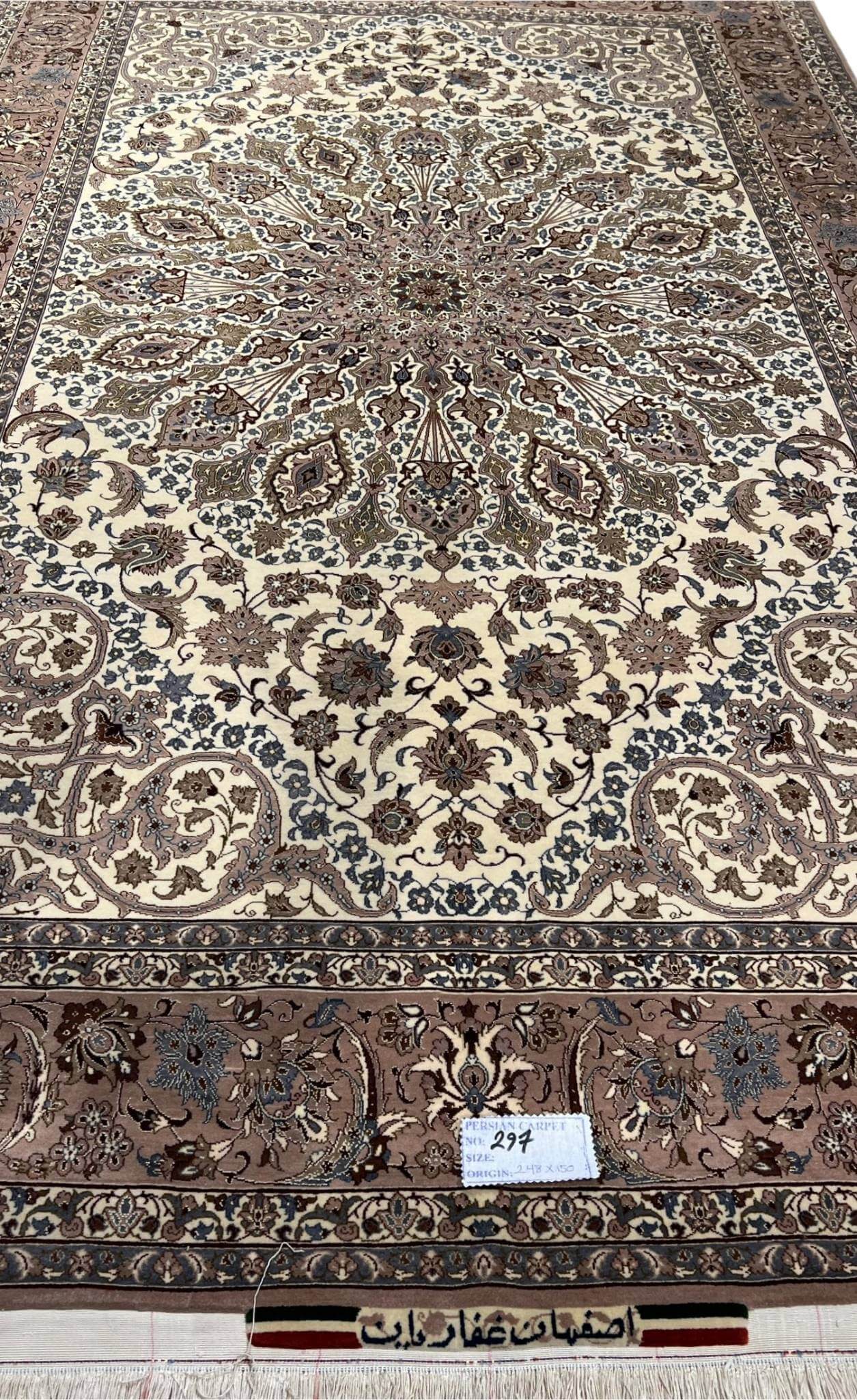 Vintage handwoven Persian carpet in beige and brown tones.